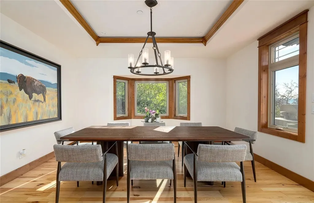 45200 Diamondback Way Home in Steamboat Springs, Colorado. Escape to a tranquil mountain retreat on Diamondback Way, offering breathtaking views and complete privacy just minutes from downtown Steamboat. This expansive property boasts 40 acres, hiking trails, and outdoor living spaces. The home features a great room with vaulted ceilings, a central kitchen for entertaining, and 6 bedrooms including primary suites. Enjoy the outdoors with a fire pit, hot tub, and acres of land for recreation. Horses are welcome, and the property has a high-producing well. Embrace the beauty of Steamboat's natural surroundings at this remarkable retreat.