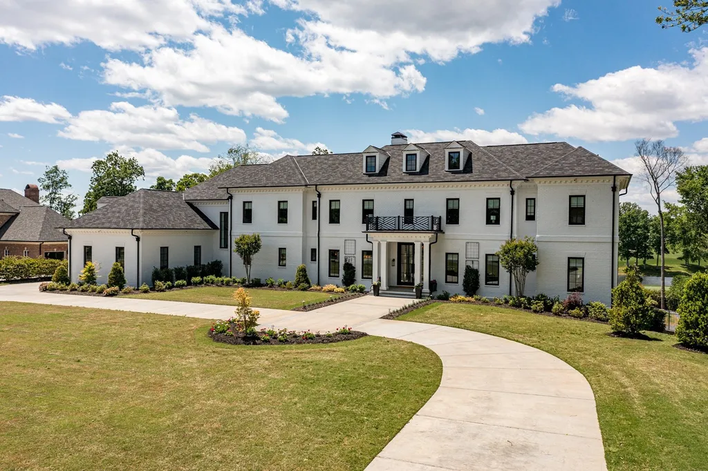 7214 Baltusrol Lane Home in Charlotte, North Carolina. Recently renovated with custom details, including Canadian Black Walnut hardwoods and Italian Calacatta marble, this home exudes elegance. The chef's kitchen, luxurious primary suite, and outdoor entertainment area with a pool and fireplace make this home the epitome of luxury. With a 3-car garage and golf cart bay, it caters to every need. Don't miss this opportunity to own a truly remarkable property.