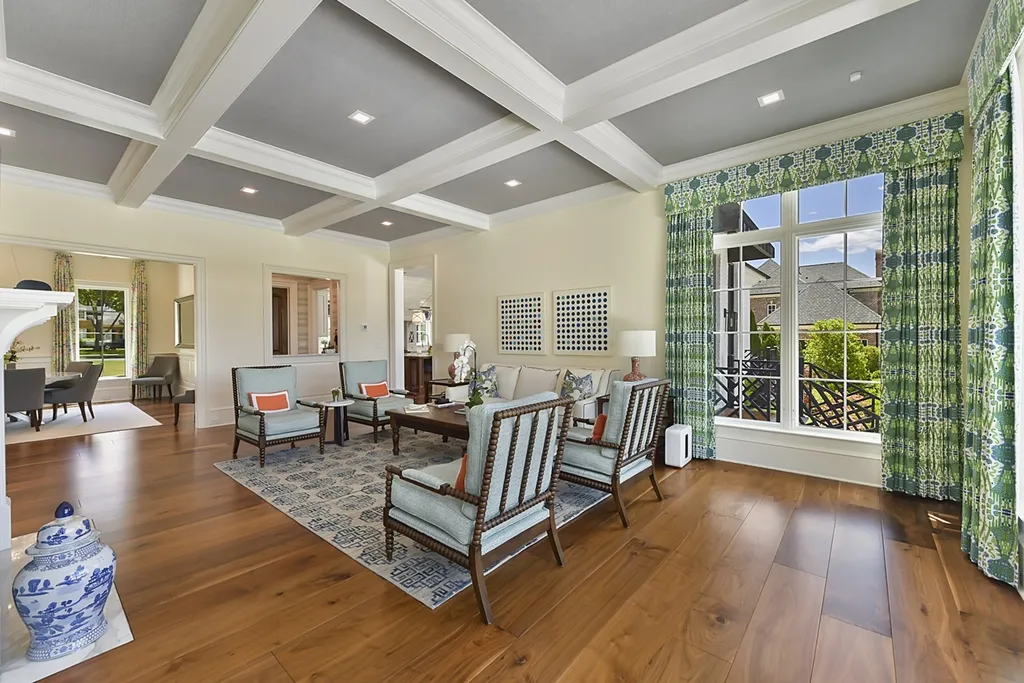 7214 Baltusrol Lane Home in Charlotte, North Carolina. Recently renovated with custom details, including Canadian Black Walnut hardwoods and Italian Calacatta marble, this home exudes elegance. The chef's kitchen, luxurious primary suite, and outdoor entertainment area with a pool and fireplace make this home the epitome of luxury. With a 3-car garage and golf cart bay, it caters to every need. Don't miss this opportunity to own a truly remarkable property.