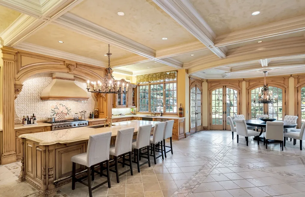 887 Closter Dock Road Home in Alpine, New Jersey. This extraordinary architectural triumph harmoniously blends classic European design with a contemporary touch. Set within an expansive 8-acre property, this magnificent home boasts approximately 35,000 sqft of living space, including the lower level. Prepare to be captivated by the grandeur of the dramatic foyer, generously sized rooms, and an abundance of natural light throughout. With 10 spacious bedroom en suites, 17 bathrooms, a chef's kitchen, formal dining room, family room, and a spectacular great room with a custom bar, every corner of this estate exudes luxury. 