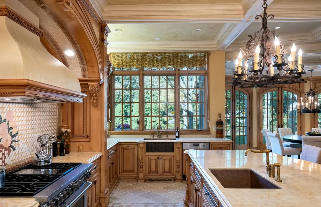 887 Closter Dock Road Home in Alpine, New Jersey. This extraordinary architectural triumph harmoniously blends classic European design with a contemporary touch. Set within an expansive 8-acre property, this magnificent home boasts approximately 35,000 sqft of living space, including the lower level. Prepare to be captivated by the grandeur of the dramatic foyer, generously sized rooms, and an abundance of natural light throughout. With 10 spacious bedroom en suites, 17 bathrooms, a chef's kitchen, formal dining room, family room, and a spectacular great room with a custom bar, every corner of this estate exudes luxury. 