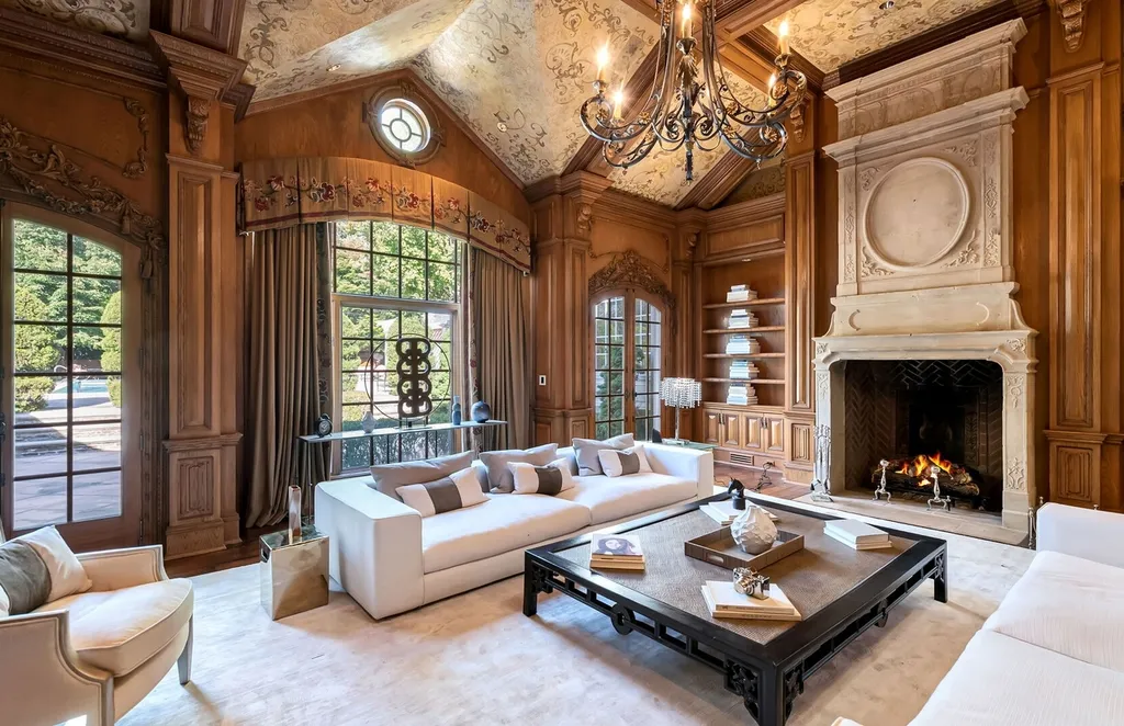 887 Closter Dock Road Home in Alpine, New Jersey. This extraordinary architectural triumph harmoniously blends classic European design with a contemporary touch. Set within an expansive 8-acre property, this magnificent home boasts approximately 35,000 sqft of living space, including the lower level. Prepare to be captivated by the grandeur of the dramatic foyer, generously sized rooms, and an abundance of natural light throughout. With 10 spacious bedroom en suites, 17 bathrooms, a chef's kitchen, formal dining room, family room, and a spectacular great room with a custom bar, every corner of this estate exudes luxury. 
