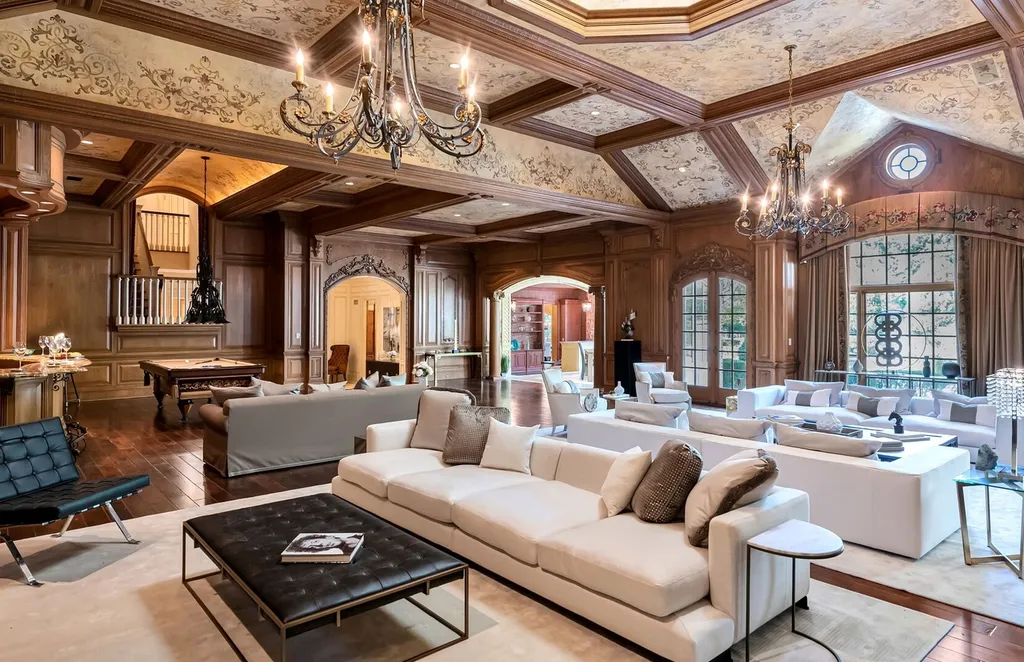 887 Closter Dock Road Home in Alpine, New Jersey. This extraordinary architectural triumph harmoniously blends classic European design with a contemporary touch. Set within an expansive 8-acre property, this magnificent home boasts approximately 35,000 sqft of living space, including the lower level. Prepare to be captivated by the grandeur of the dramatic foyer, generously sized rooms, and an abundance of natural light throughout. With 10 spacious bedroom en suites, 17 bathrooms, a chef's kitchen, formal dining room, family room, and a spectacular great room with a custom bar, every corner of this estate exudes luxury. 
