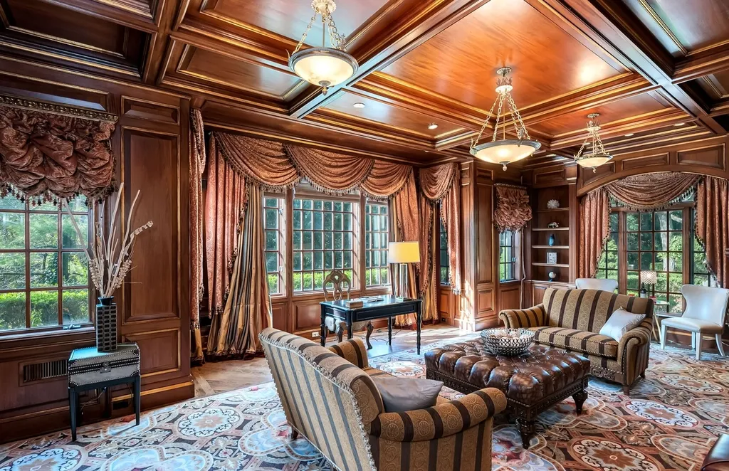 887 Closter Dock Road Home in Alpine, New Jersey. This extraordinary architectural triumph harmoniously blends classic European design with a contemporary touch. Set within an expansive 8-acre property, this magnificent home boasts approximately 35,000 sqft of living space, including the lower level. Prepare to be captivated by the grandeur of the dramatic foyer, generously sized rooms, and an abundance of natural light throughout. With 10 spacious bedroom en suites, 17 bathrooms, a chef's kitchen, formal dining room, family room, and a spectacular great room with a custom bar, every corner of this estate exudes luxury. 