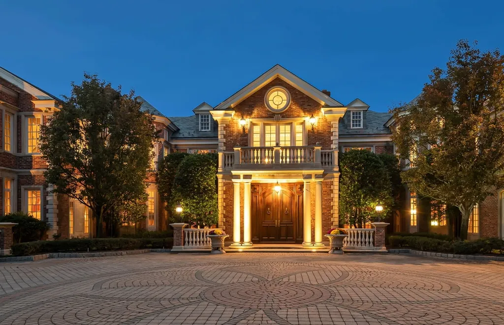 887 Closter Dock Road Home in Alpine, New Jersey. This extraordinary architectural triumph harmoniously blends classic European design with a contemporary touch. Set within an expansive 8-acre property, this magnificent home boasts approximately 35,000 sqft of living space, including the lower level. Prepare to be captivated by the grandeur of the dramatic foyer, generously sized rooms, and an abundance of natural light throughout. With 10 spacious bedroom en suites, 17 bathrooms, a chef's kitchen, formal dining room, family room, and a spectacular great room with a custom bar, every corner of this estate exudes luxury. 