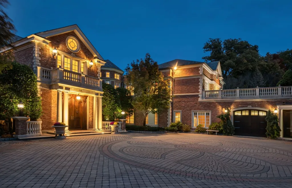 887 Closter Dock Road Home in Alpine, New Jersey. This extraordinary architectural triumph harmoniously blends classic European design with a contemporary touch. Set within an expansive 8-acre property, this magnificent home boasts approximately 35,000 sqft of living space, including the lower level. Prepare to be captivated by the grandeur of the dramatic foyer, generously sized rooms, and an abundance of natural light throughout. With 10 spacious bedroom en suites, 17 bathrooms, a chef's kitchen, formal dining room, family room, and a spectacular great room with a custom bar, every corner of this estate exudes luxury. 