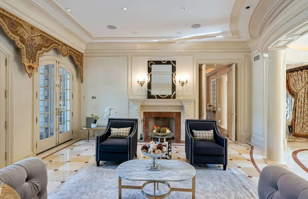 887 Closter Dock Road Home in Alpine, New Jersey. This extraordinary architectural triumph harmoniously blends classic European design with a contemporary touch. Set within an expansive 8-acre property, this magnificent home boasts approximately 35,000 sqft of living space, including the lower level. Prepare to be captivated by the grandeur of the dramatic foyer, generously sized rooms, and an abundance of natural light throughout. With 10 spacious bedroom en suites, 17 bathrooms, a chef's kitchen, formal dining room, family room, and a spectacular great room with a custom bar, every corner of this estate exudes luxury. 