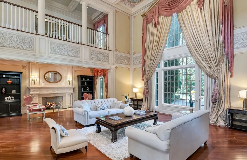 887 Closter Dock Road Home in Alpine, New Jersey. This extraordinary architectural triumph harmoniously blends classic European design with a contemporary touch. Set within an expansive 8-acre property, this magnificent home boasts approximately 35,000 sqft of living space, including the lower level. Prepare to be captivated by the grandeur of the dramatic foyer, generously sized rooms, and an abundance of natural light throughout. With 10 spacious bedroom en suites, 17 bathrooms, a chef's kitchen, formal dining room, family room, and a spectacular great room with a custom bar, every corner of this estate exudes luxury. 