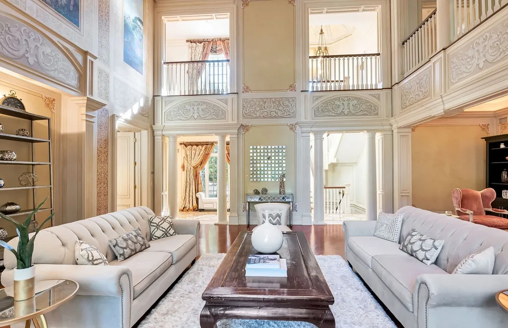 887 Closter Dock Road Home in Alpine, New Jersey. This extraordinary architectural triumph harmoniously blends classic European design with a contemporary touch. Set within an expansive 8-acre property, this magnificent home boasts approximately 35,000 sqft of living space, including the lower level. Prepare to be captivated by the grandeur of the dramatic foyer, generously sized rooms, and an abundance of natural light throughout. With 10 spacious bedroom en suites, 17 bathrooms, a chef's kitchen, formal dining room, family room, and a spectacular great room with a custom bar, every corner of this estate exudes luxury. 