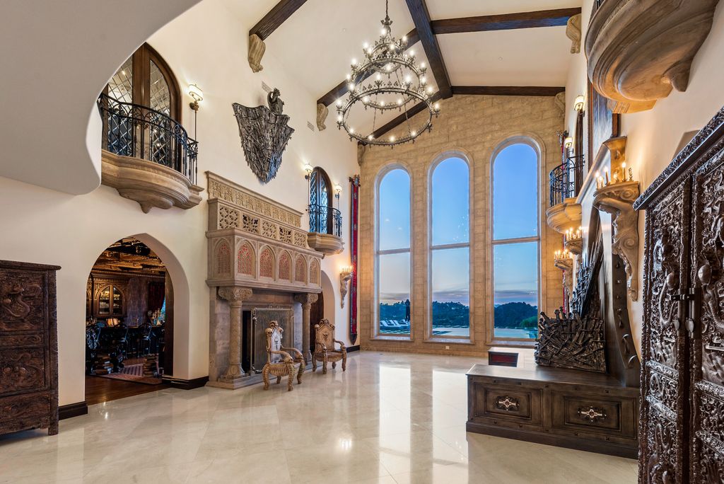 9 Beverly Ridge Terrace Home in Beverly Hills, California. Nestled behind double guard gates in the prestigious Beverly Ridge Estates, this custom-built Italian Romanticism-inspired home boasts modern-day conveniences while showcasing the intricately designed craftsmanship of renowned architect, Robert Rivani.