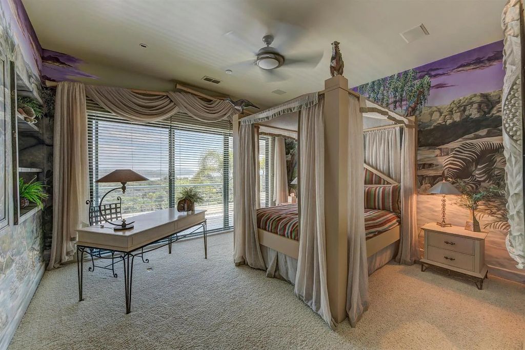 9125 Vista De Lago Court Home in Granite Bay, California. This grand estate is located at the highest point of Los Lagos, providing breathtaking views of Folsom Lake, the Sierra Nevada Mountains, and the Sacramento skyline. The main house boasts over 11,500 square feet while the guest house offers an additional 5,200 square feet.