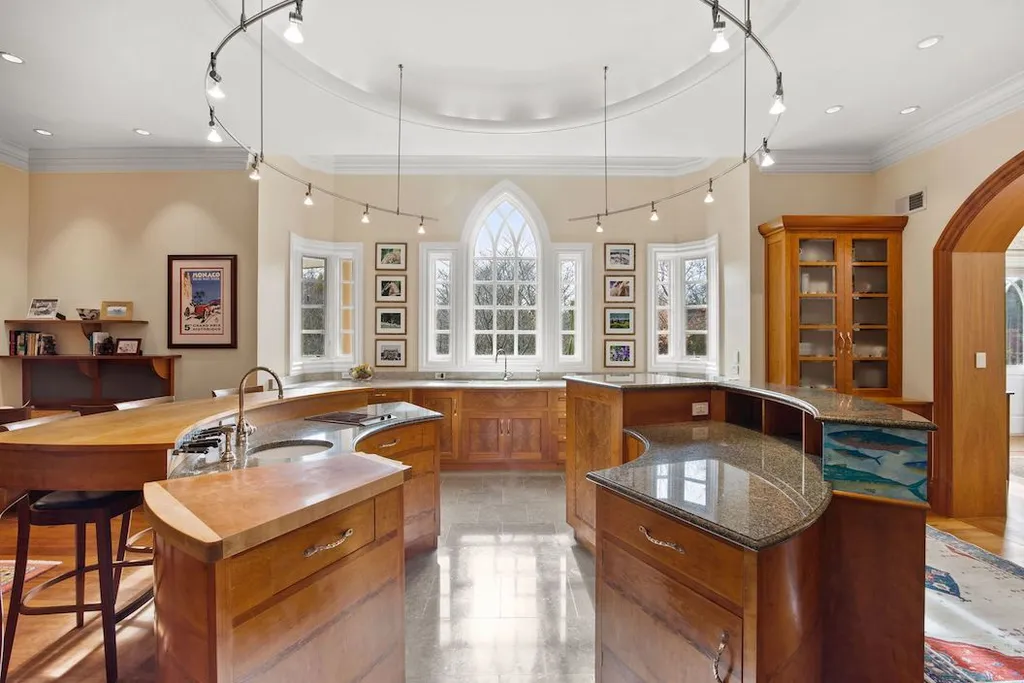 9351 Cornwell Farm Drive Home in Great Falls, Virginia. Experience the epitome of refined living at Wildersmoor House, an extraordinary blend of old-world craftsmanship and modern luxury. Set on a sprawling 17.3-acre estate in the serene hills of Great Falls, Virginia, this secluded residence offers a perfect balance of privacy and convenience.