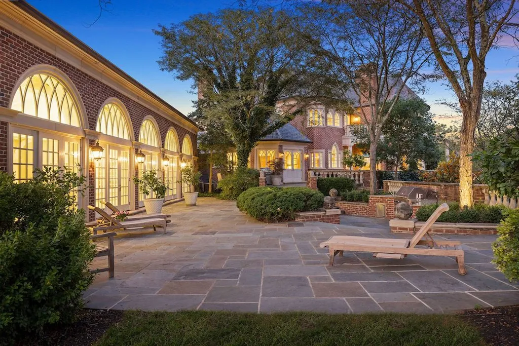 9351 Cornwell Farm Drive Home in Great Falls, Virginia. Experience the epitome of refined living at Wildersmoor House, an extraordinary blend of old-world craftsmanship and modern luxury. Set on a sprawling 17.3-acre estate in the serene hills of Great Falls, Virginia, this secluded residence offers a perfect balance of privacy and convenience.