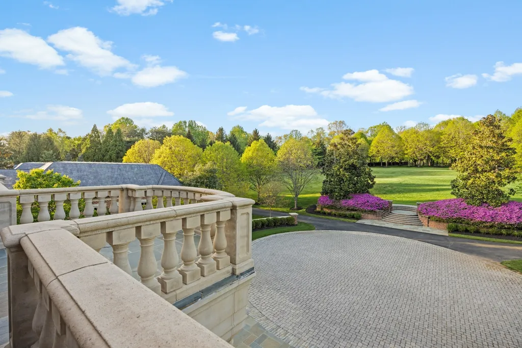 9351 Cornwell Farm Drive Home in Great Falls, Virginia. Experience the epitome of refined living at Wildersmoor House, an extraordinary blend of old-world craftsmanship and modern luxury. Set on a sprawling 17.3-acre estate in the serene hills of Great Falls, Virginia, this secluded residence offers a perfect balance of privacy and convenience.
