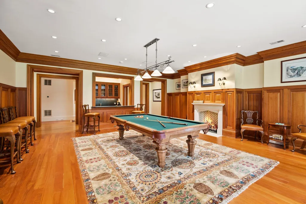 9351 Cornwell Farm Drive Home in Great Falls, Virginia. Experience the epitome of refined living at Wildersmoor House, an extraordinary blend of old-world craftsmanship and modern luxury. Set on a sprawling 17.3-acre estate in the serene hills of Great Falls, Virginia, this secluded residence offers a perfect balance of privacy and convenience.