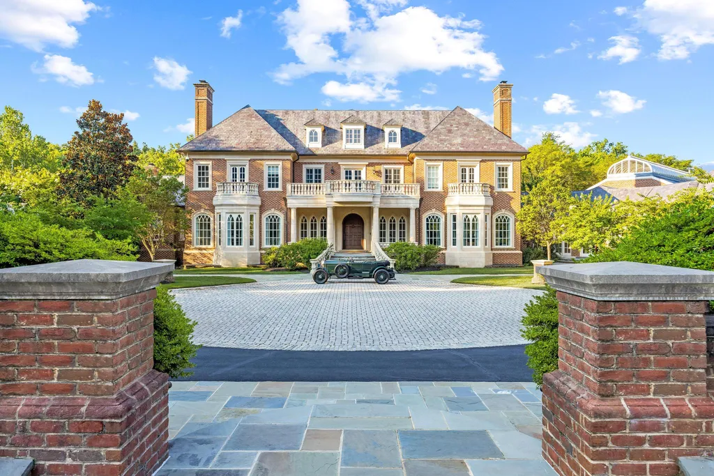 9351 Cornwell Farm Drive Home in Great Falls, Virginia. Experience the epitome of refined living at Wildersmoor House, an extraordinary blend of old-world craftsmanship and modern luxury. Set on a sprawling 17.3-acre estate in the serene hills of Great Falls, Virginia, this secluded residence offers a perfect balance of privacy and convenience.