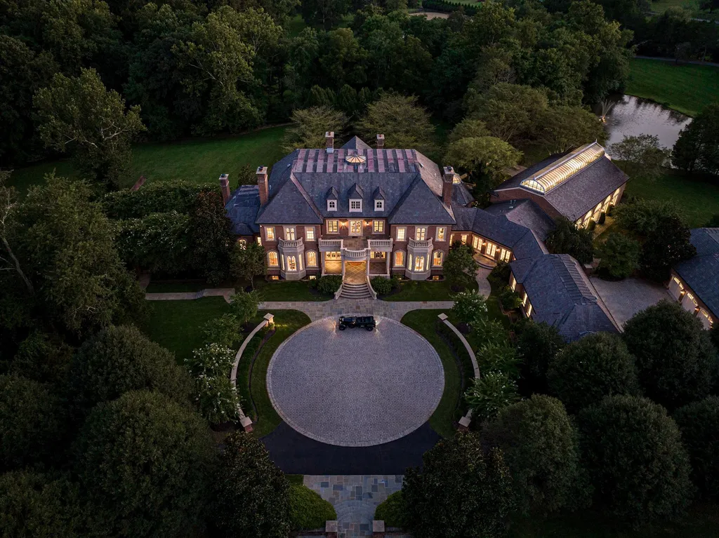 9351 Cornwell Farm Drive Home in Great Falls, Virginia. Experience the epitome of refined living at Wildersmoor House, an extraordinary blend of old-world craftsmanship and modern luxury. Set on a sprawling 17.3-acre estate in the serene hills of Great Falls, Virginia, this secluded residence offers a perfect balance of privacy and convenience.