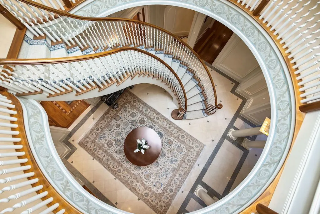 9351 Cornwell Farm Drive Home in Great Falls, Virginia. Experience the epitome of refined living at Wildersmoor House, an extraordinary blend of old-world craftsmanship and modern luxury. Set on a sprawling 17.3-acre estate in the serene hills of Great Falls, Virginia, this secluded residence offers a perfect balance of privacy and convenience.