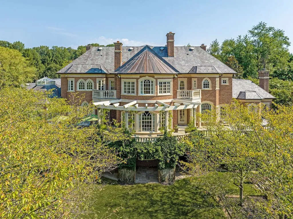 9351 Cornwell Farm Drive Home in Great Falls, Virginia. Experience the epitome of refined living at Wildersmoor House, an extraordinary blend of old-world craftsmanship and modern luxury. Set on a sprawling 17.3-acre estate in the serene hills of Great Falls, Virginia, this secluded residence offers a perfect balance of privacy and convenience.