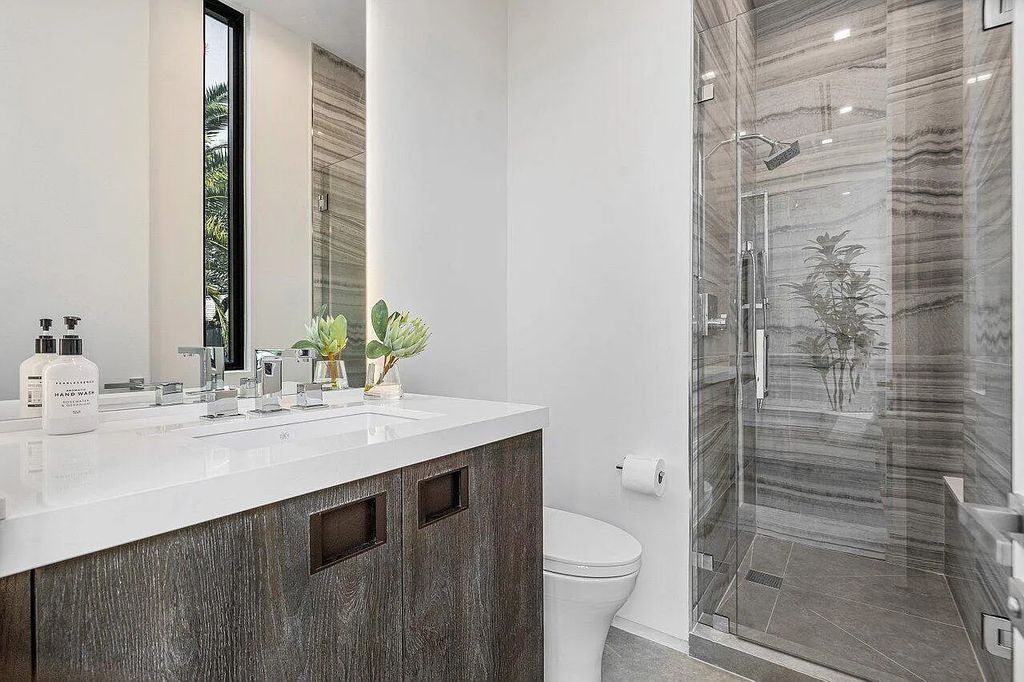 Discover 650 Tern Point Circle, Boca Raton, Florida—a stunning waterfront estate in The Sanctuary. This brand-new residence offers 6 beds, 10 baths, and 8,826 sq ft. With bright Southern Exposure, soaring ceilings, and elegant design, it's a true masterpiece.