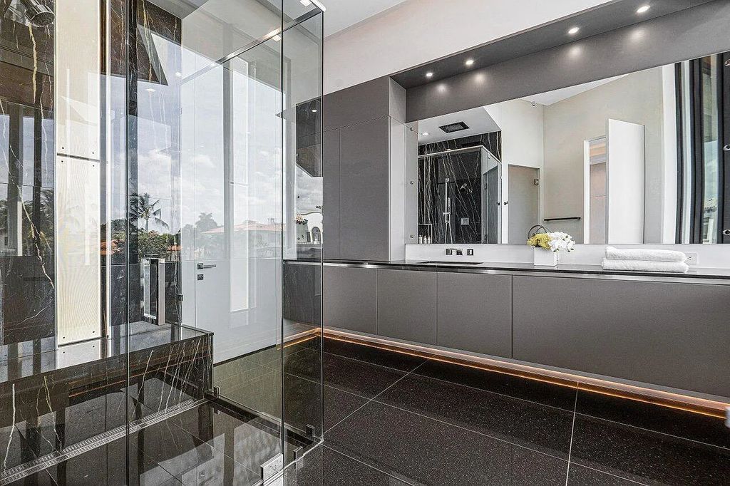 Discover 650 Tern Point Circle, Boca Raton, Florida—a stunning waterfront estate in The Sanctuary. This brand-new residence offers 6 beds, 10 baths, and 8,826 sq ft. With bright Southern Exposure, soaring ceilings, and elegant design, it's a true masterpiece.