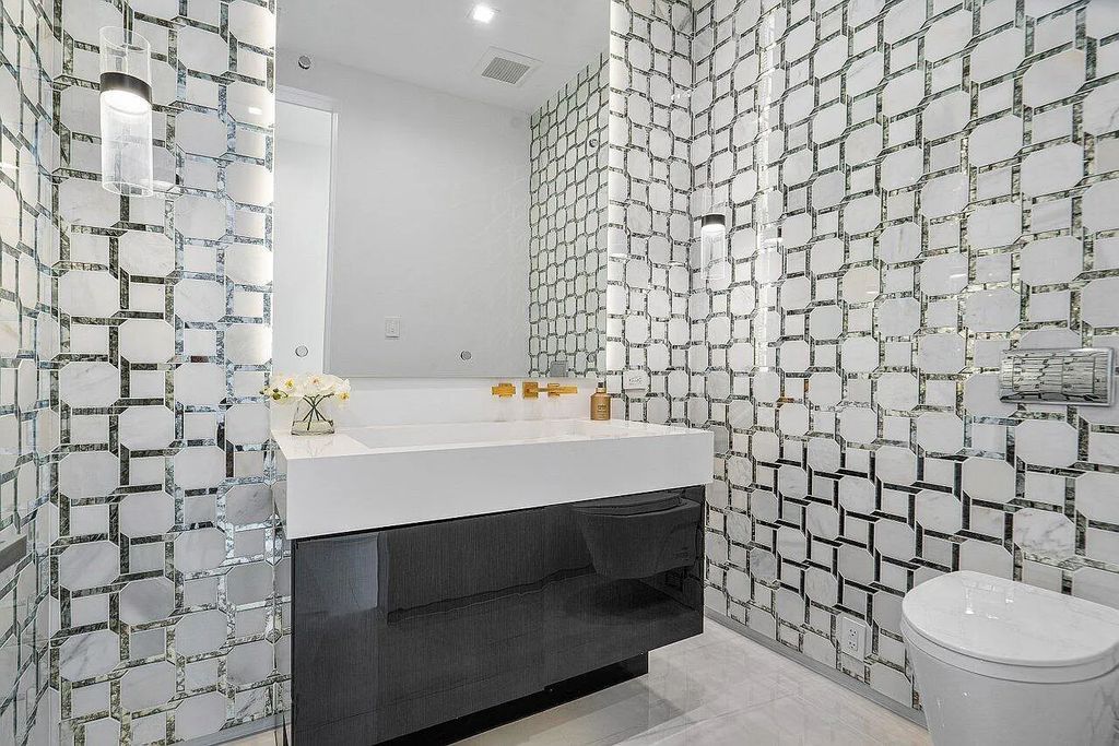 Discover 650 Tern Point Circle, Boca Raton, Florida—a stunning waterfront estate in The Sanctuary. This brand-new residence offers 6 beds, 10 baths, and 8,826 sq ft. With bright Southern Exposure, soaring ceilings, and elegant design, it's a true masterpiece.