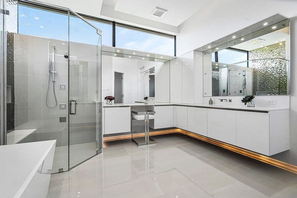 Discover 650 Tern Point Circle, Boca Raton, Florida—a stunning waterfront estate in The Sanctuary. This brand-new residence offers 6 beds, 10 baths, and 8,826 sq ft. With bright Southern Exposure, soaring ceilings, and elegant design, it's a true masterpiece.