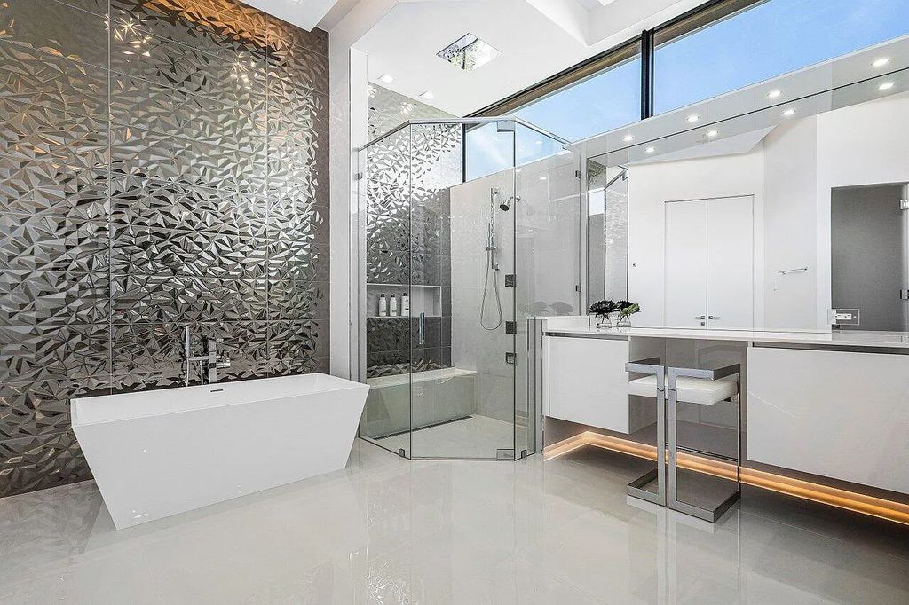 Discover 650 Tern Point Circle, Boca Raton, Florida—a stunning waterfront estate in The Sanctuary. This brand-new residence offers 6 beds, 10 baths, and 8,826 sq ft. With bright Southern Exposure, soaring ceilings, and elegant design, it's a true masterpiece.