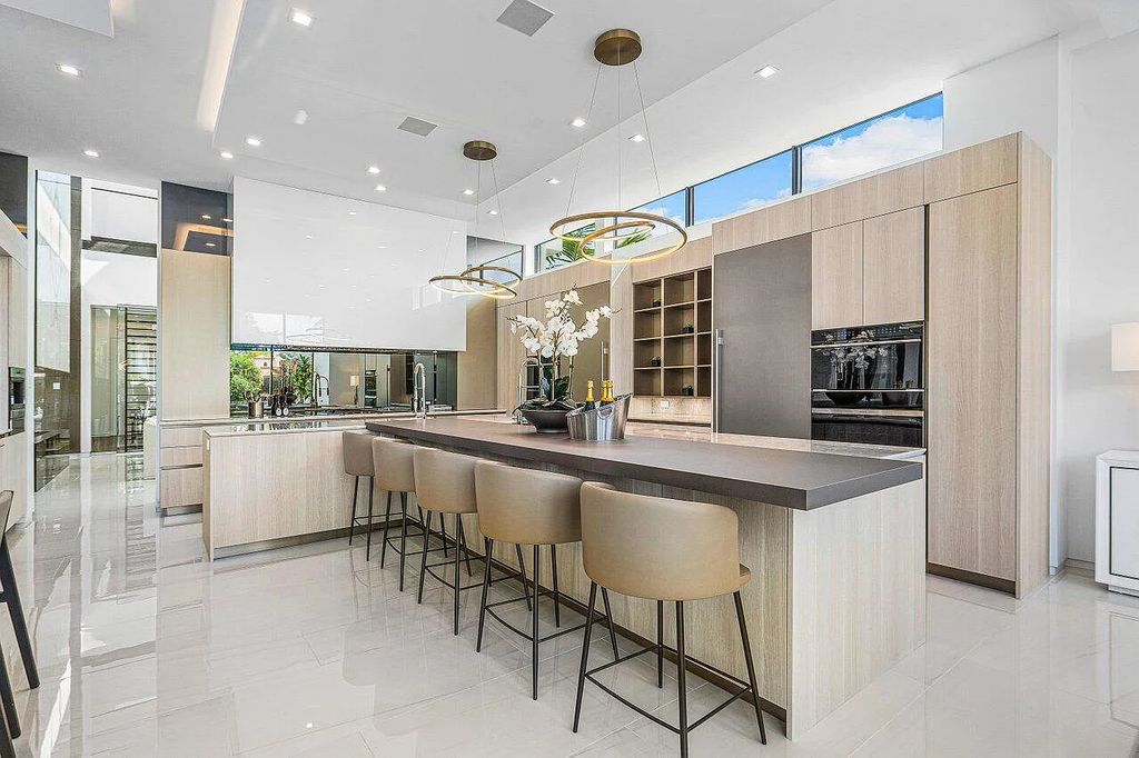 Discover 650 Tern Point Circle, Boca Raton, Florida—a stunning waterfront estate in The Sanctuary. This brand-new residence offers 6 beds, 10 baths, and 8,826 sq ft. With bright Southern Exposure, soaring ceilings, and elegant design, it's a true masterpiece.