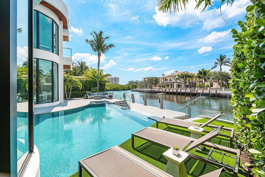 Discover 650 Tern Point Circle, Boca Raton, Florida—a stunning waterfront estate in The Sanctuary. This brand-new residence offers 6 beds, 10 baths, and 8,826 sq ft. With bright Southern Exposure, soaring ceilings, and elegant design, it's a true masterpiece.