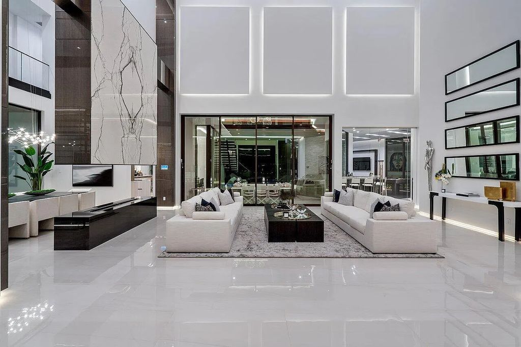 Discover 650 Tern Point Circle, Boca Raton, Florida—a stunning waterfront estate in The Sanctuary. This brand-new residence offers 6 beds, 10 baths, and 8,826 sq ft. With bright Southern Exposure, soaring ceilings, and elegant design, it's a true masterpiece.