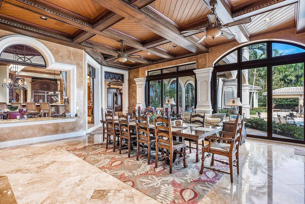 Welcome to 2330 Seven Oaks Lane, Palm Beach Gardens, Florida! This majestic waterfront estate sprawls nearly 3 acres of direct intracoastal waterway, offering 150' of deep water access and a no wake zone.