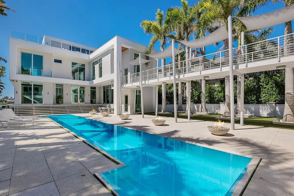Experience luxury living at its finest with this modern masterpiece at 1325 Westway Drive, Sarasota, Florida. This SMART home features 5 beds, 8 baths, and a 6,590 sq. ft. living space on a 0.41-acre lot.