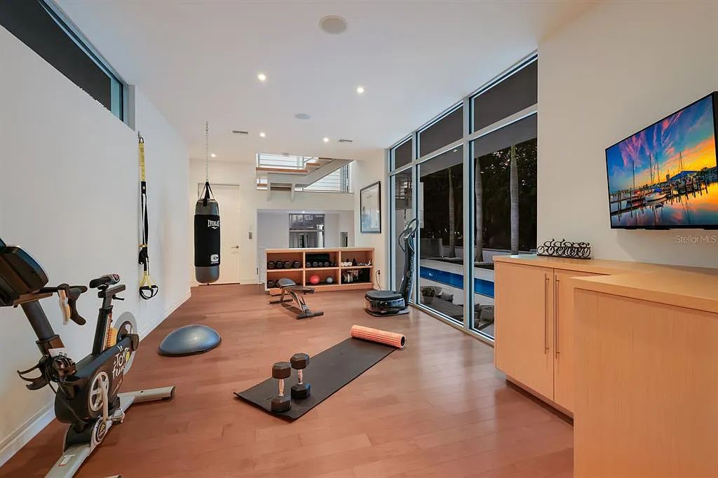 Experience luxury living at its finest with this modern masterpiece at 1325 Westway Drive, Sarasota, Florida. This SMART home features 5 beds, 8 baths, and a 6,590 sq. ft. living space on a 0.41-acre lot.