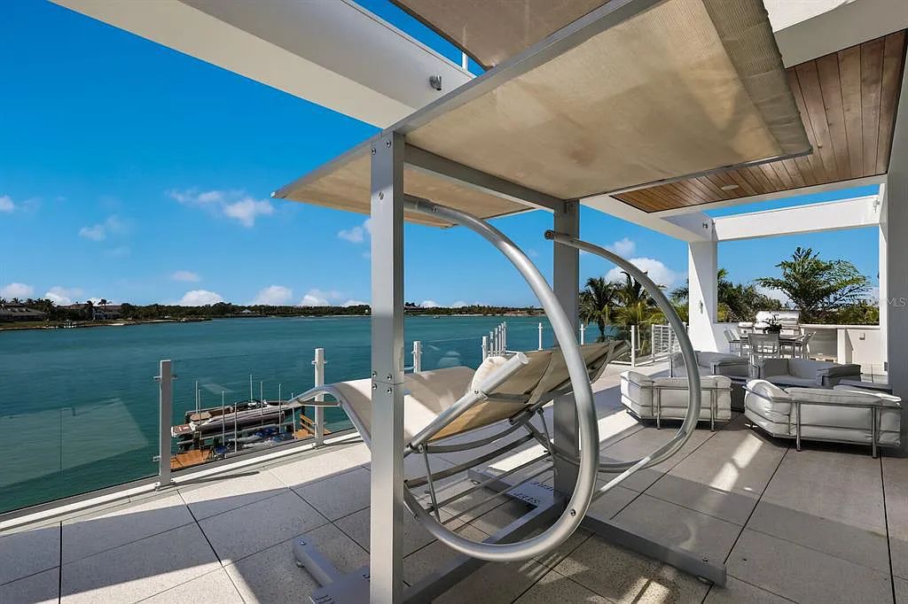 Experience luxury living at its finest with this modern masterpiece at 1325 Westway Drive, Sarasota, Florida. This SMART home features 5 beds, 8 baths, and a 6,590 sq. ft. living space on a 0.41-acre lot.