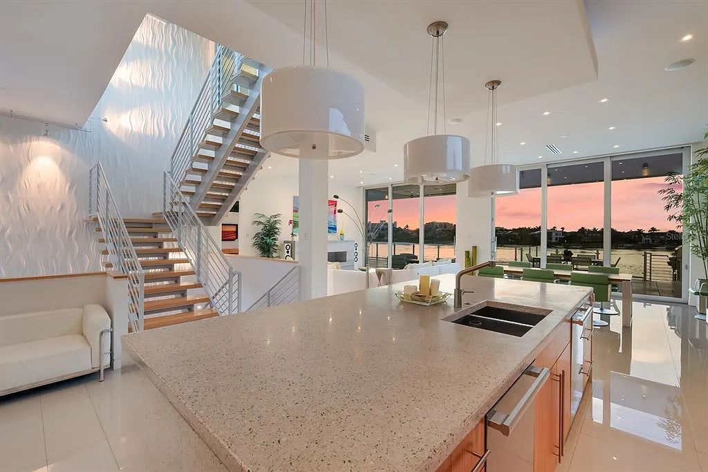 Experience luxury living at its finest with this modern masterpiece at 1325 Westway Drive, Sarasota, Florida. This SMART home features 5 beds, 8 baths, and a 6,590 sq. ft. living space on a 0.41-acre lot.