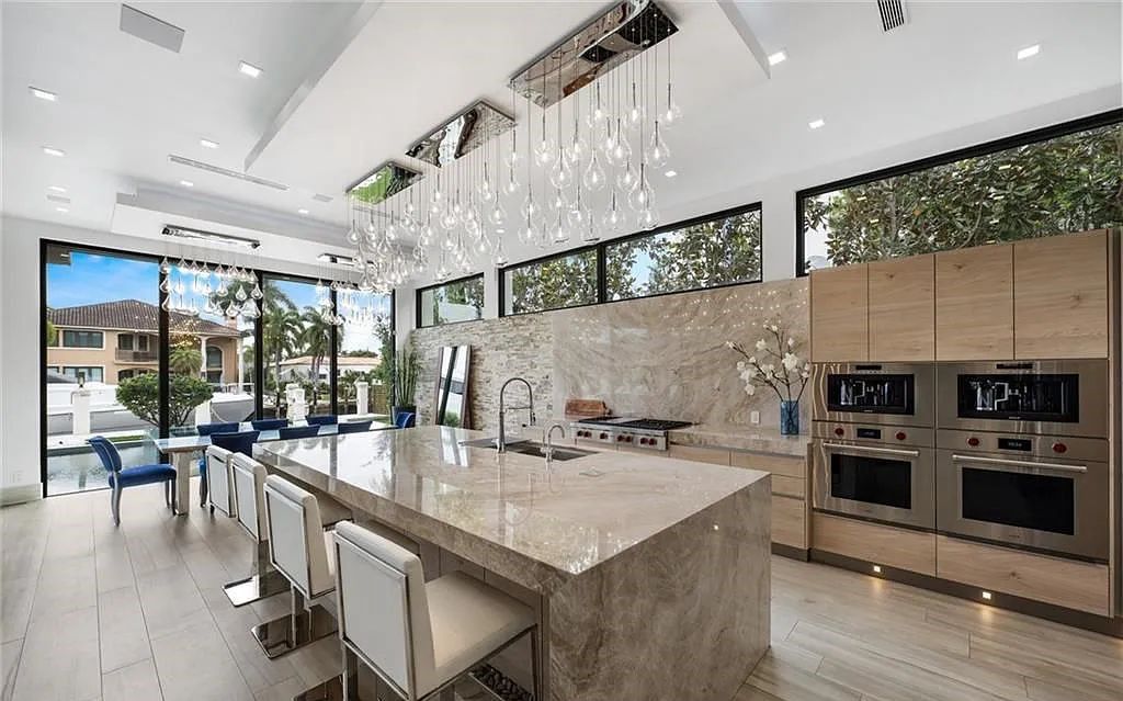 Experience luxury waterfront living at its finest at 2437 Delmar Place, Fort Lauderdale, Florida! This stunning modern estate features 6 bedrooms, 10 bathrooms, and over 7,000 sq ft of living space on an oversized lot with a 12x103 ft concrete dock and privacy gate.