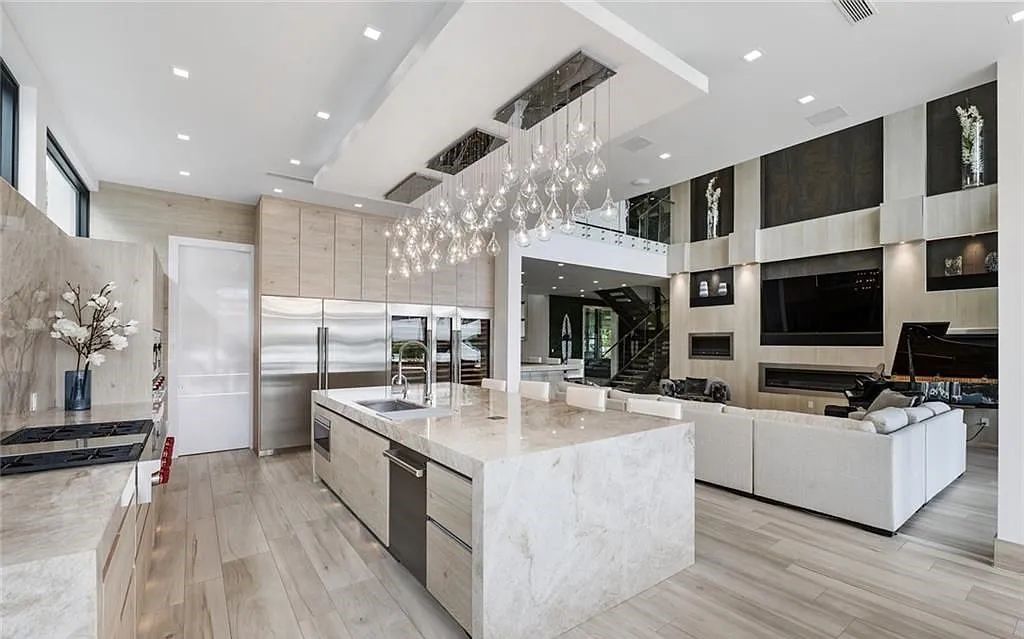 Experience luxury waterfront living at its finest at 2437 Delmar Place, Fort Lauderdale, Florida! This stunning modern estate features 6 bedrooms, 10 bathrooms, and over 7,000 sq ft of living space on an oversized lot with a 12x103 ft concrete dock and privacy gate.