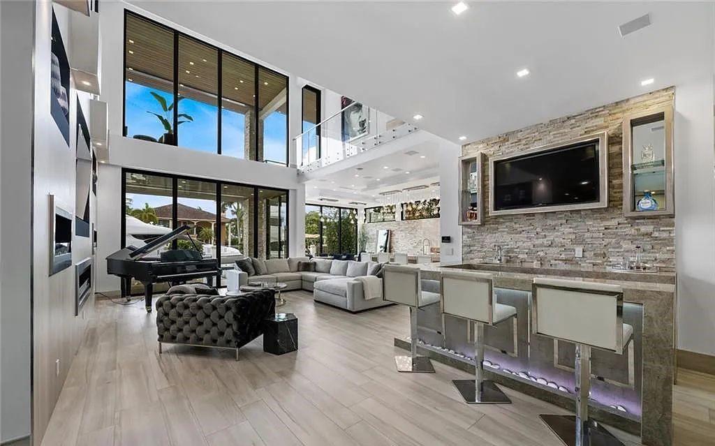 Experience luxury waterfront living at its finest at 2437 Delmar Place, Fort Lauderdale, Florida! This stunning modern estate features 6 bedrooms, 10 bathrooms, and over 7,000 sq ft of living space on an oversized lot with a 12x103 ft concrete dock and privacy gate.