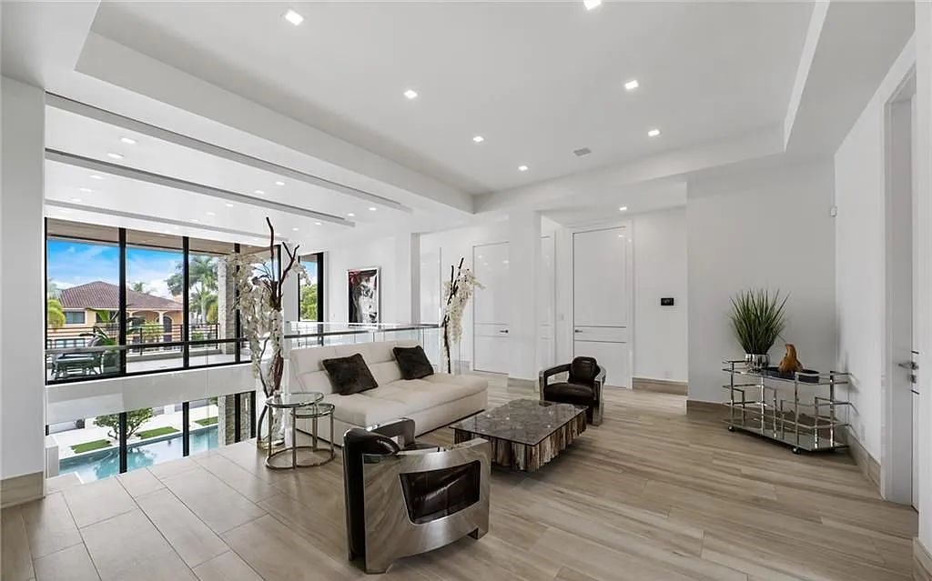 Experience luxury waterfront living at its finest at 2437 Delmar Place, Fort Lauderdale, Florida! This stunning modern estate features 6 bedrooms, 10 bathrooms, and over 7,000 sq ft of living space on an oversized lot with a 12x103 ft concrete dock and privacy gate.