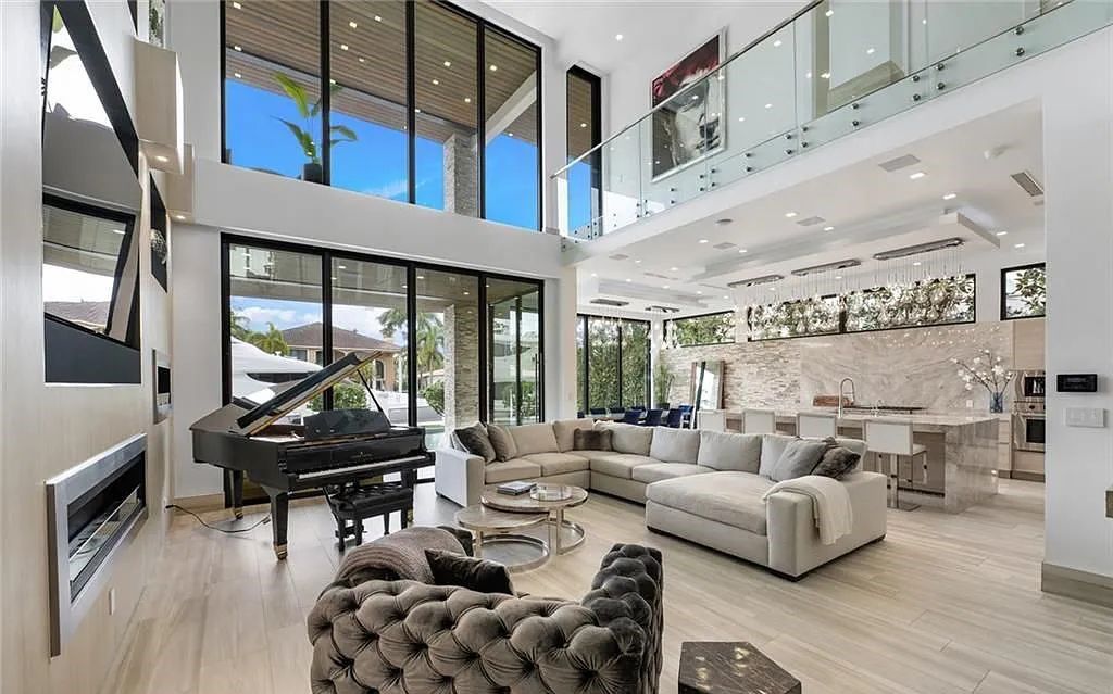 Experience luxury waterfront living at its finest at 2437 Delmar Place, Fort Lauderdale, Florida! This stunning modern estate features 6 bedrooms, 10 bathrooms, and over 7,000 sq ft of living space on an oversized lot with a 12x103 ft concrete dock and privacy gate.