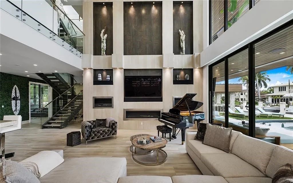 Experience luxury waterfront living at its finest at 2437 Delmar Place, Fort Lauderdale, Florida! This stunning modern estate features 6 bedrooms, 10 bathrooms, and over 7,000 sq ft of living space on an oversized lot with a 12x103 ft concrete dock and privacy gate.