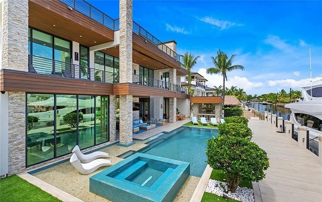 Experience luxury waterfront living at its finest at 2437 Delmar Place, Fort Lauderdale, Florida! This stunning modern estate features 6 bedrooms, 10 bathrooms, and over 7,000 sq ft of living space on an oversized lot with a 12x103 ft concrete dock and privacy gate.
