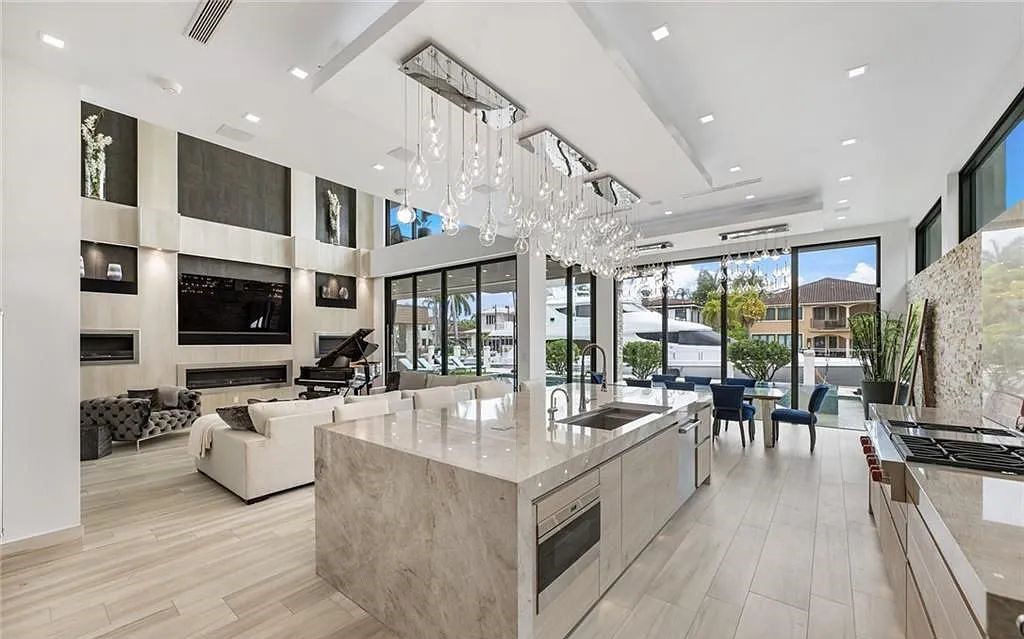 Experience luxury waterfront living at its finest at 2437 Delmar Place, Fort Lauderdale, Florida! This stunning modern estate features 6 bedrooms, 10 bathrooms, and over 7,000 sq ft of living space on an oversized lot with a 12x103 ft concrete dock and privacy gate.