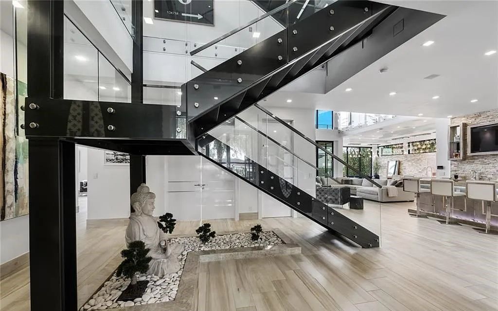 Experience luxury waterfront living at its finest at 2437 Delmar Place, Fort Lauderdale, Florida! This stunning modern estate features 6 bedrooms, 10 bathrooms, and over 7,000 sq ft of living space on an oversized lot with a 12x103 ft concrete dock and privacy gate.