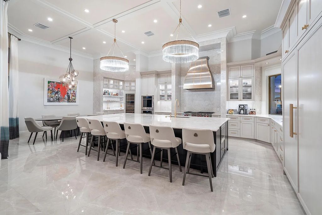 Experience the epitome of luxury living at 420 E Coconut Palm Road, Boca Raton, Florida. This meticulously renovated waterfront estate showcases 7 beds, 9 baths, and 7,216 sq ft of opulent living space.
