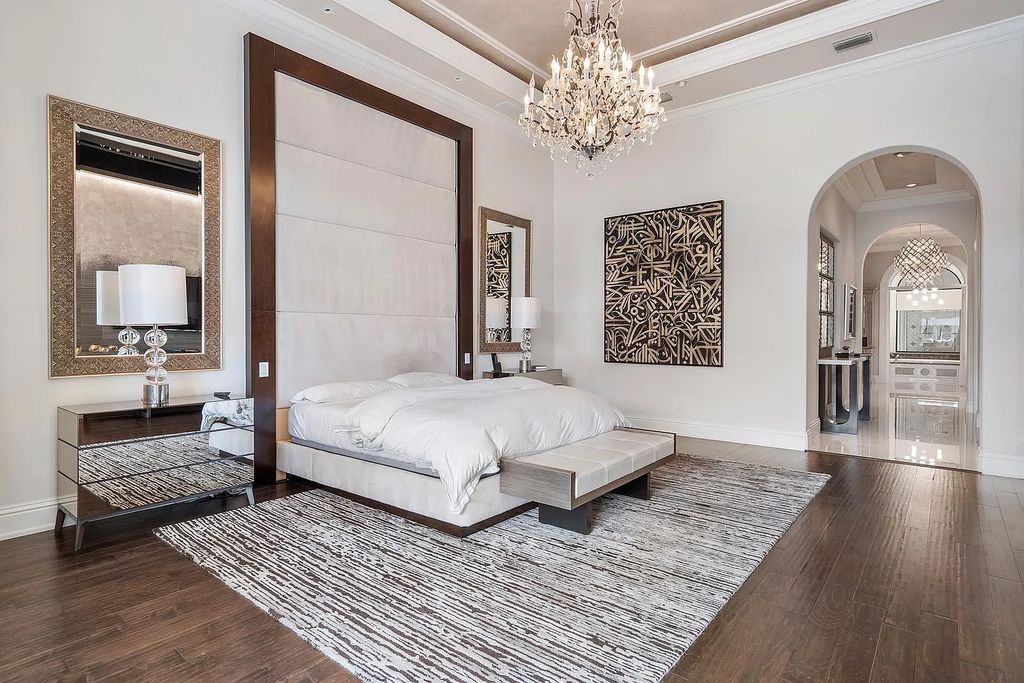 Experience the epitome of luxury living at 420 E Coconut Palm Road, Boca Raton, Florida. This meticulously renovated waterfront estate showcases 7 beds, 9 baths, and 7,216 sq ft of opulent living space.