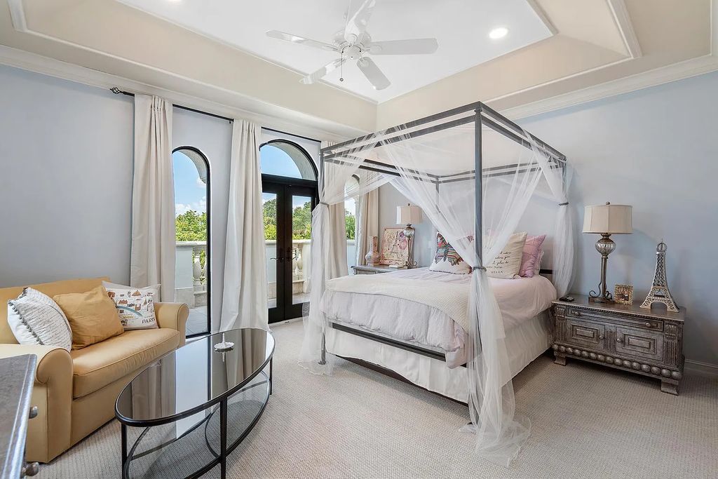Experience the epitome of luxury living at 420 E Coconut Palm Road, Boca Raton, Florida. This meticulously renovated waterfront estate showcases 7 beds, 9 baths, and 7,216 sq ft of opulent living space.