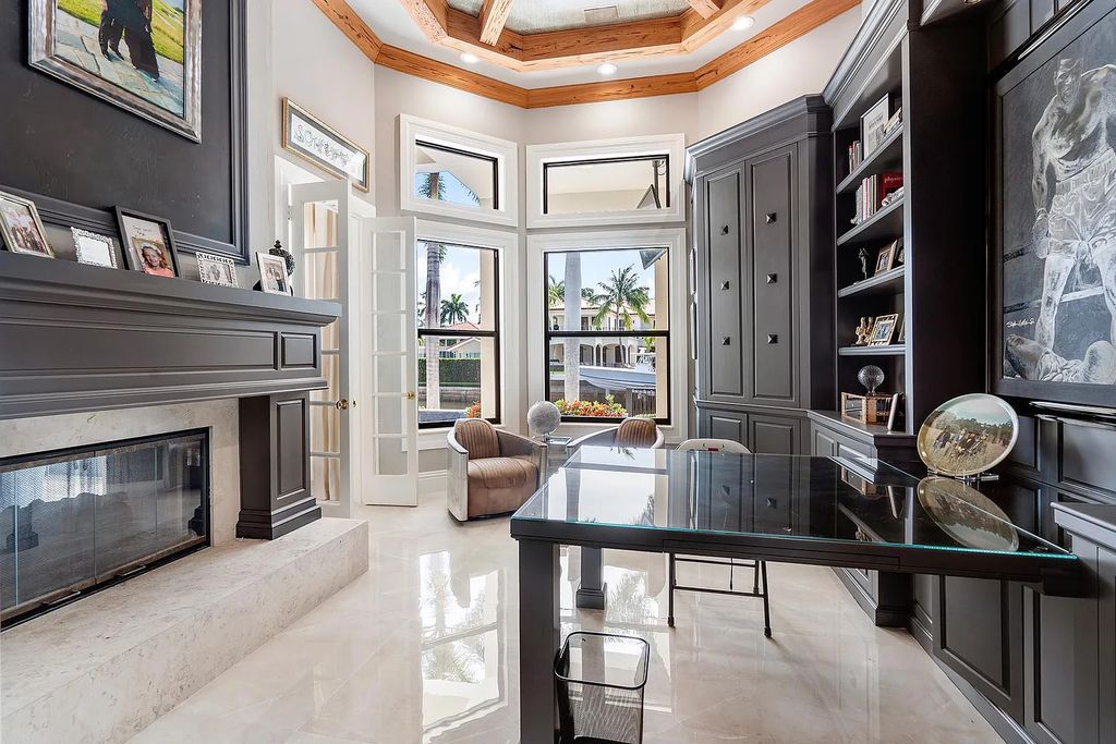 Experience the epitome of luxury living at 420 E Coconut Palm Road, Boca Raton, Florida. This meticulously renovated waterfront estate showcases 7 beds, 9 baths, and 7,216 sq ft of opulent living space.