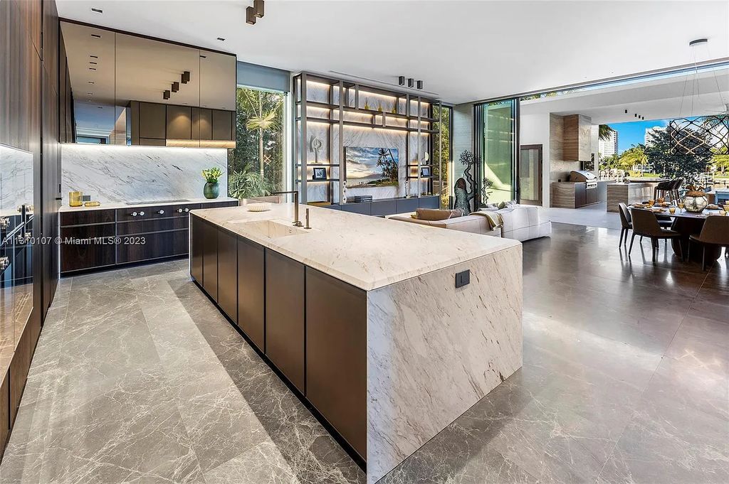 Presenting 98 La Gorce Circle, Miami Beach, Florida an extraordinary Villa Arte by Aquablue Group on Miami Beach's exclusive La Gorce Island. This stunning 7-bedrooms, 13-bathrooms residence spans 14,060 square feet, situated on a 0.76-acre lot.